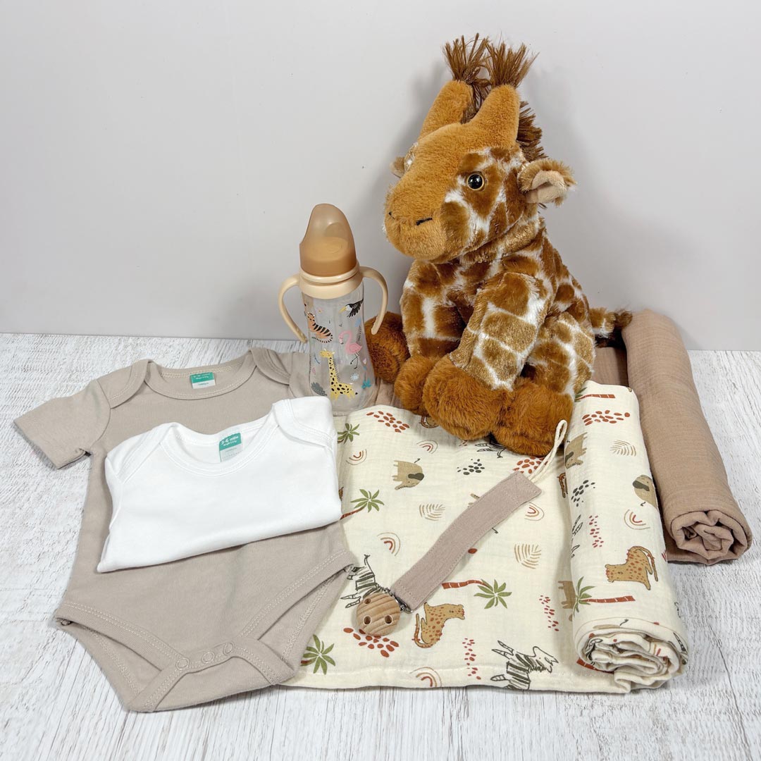 gender neutral baby box contents on table