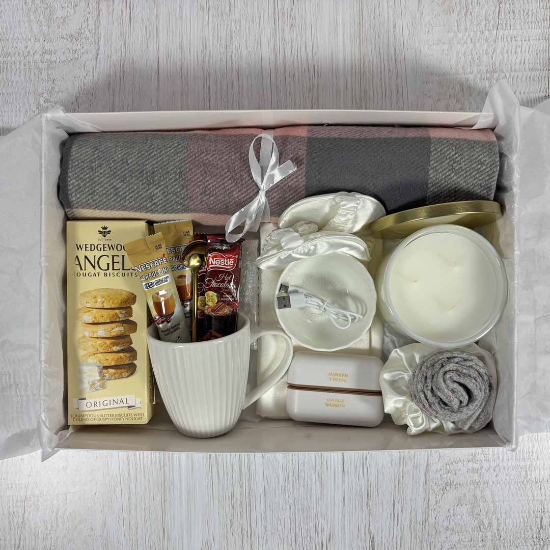 cozy box pink contents displayed packed in a box