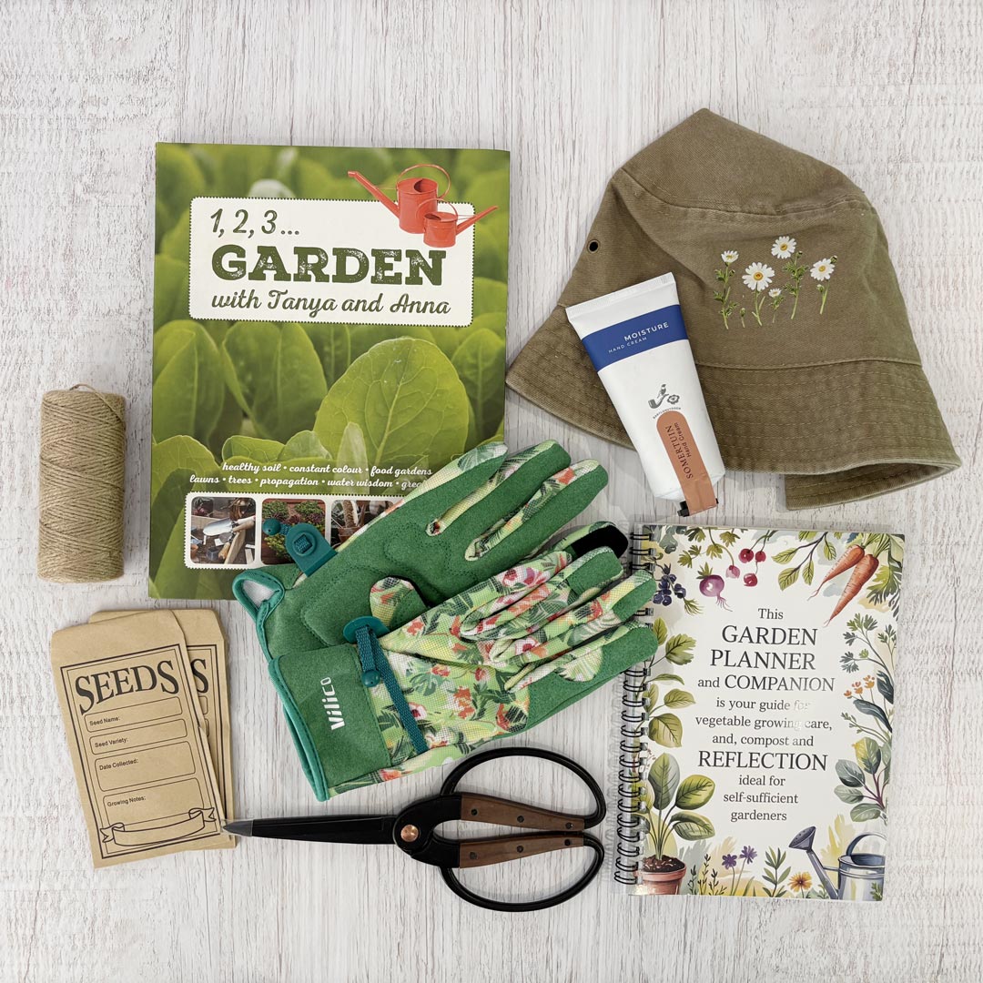 The Garden Lover’s gift box with gardening gloves, embroidered hat, garden planner, gardening book, scissors, seed envelopes and hand cream